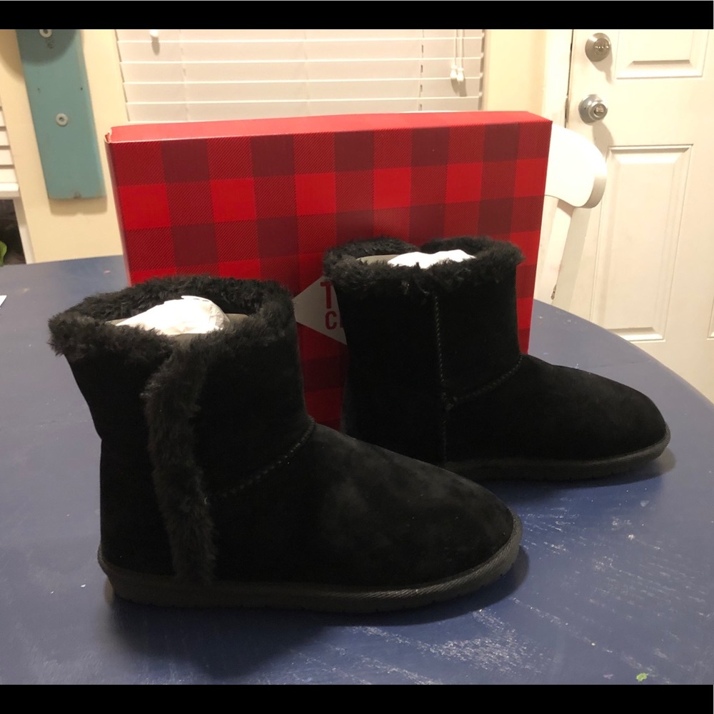 Woman’s black boots